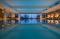 South Lodge spa indoor infinity swimming pool photographed at dusk by Amy Murrell